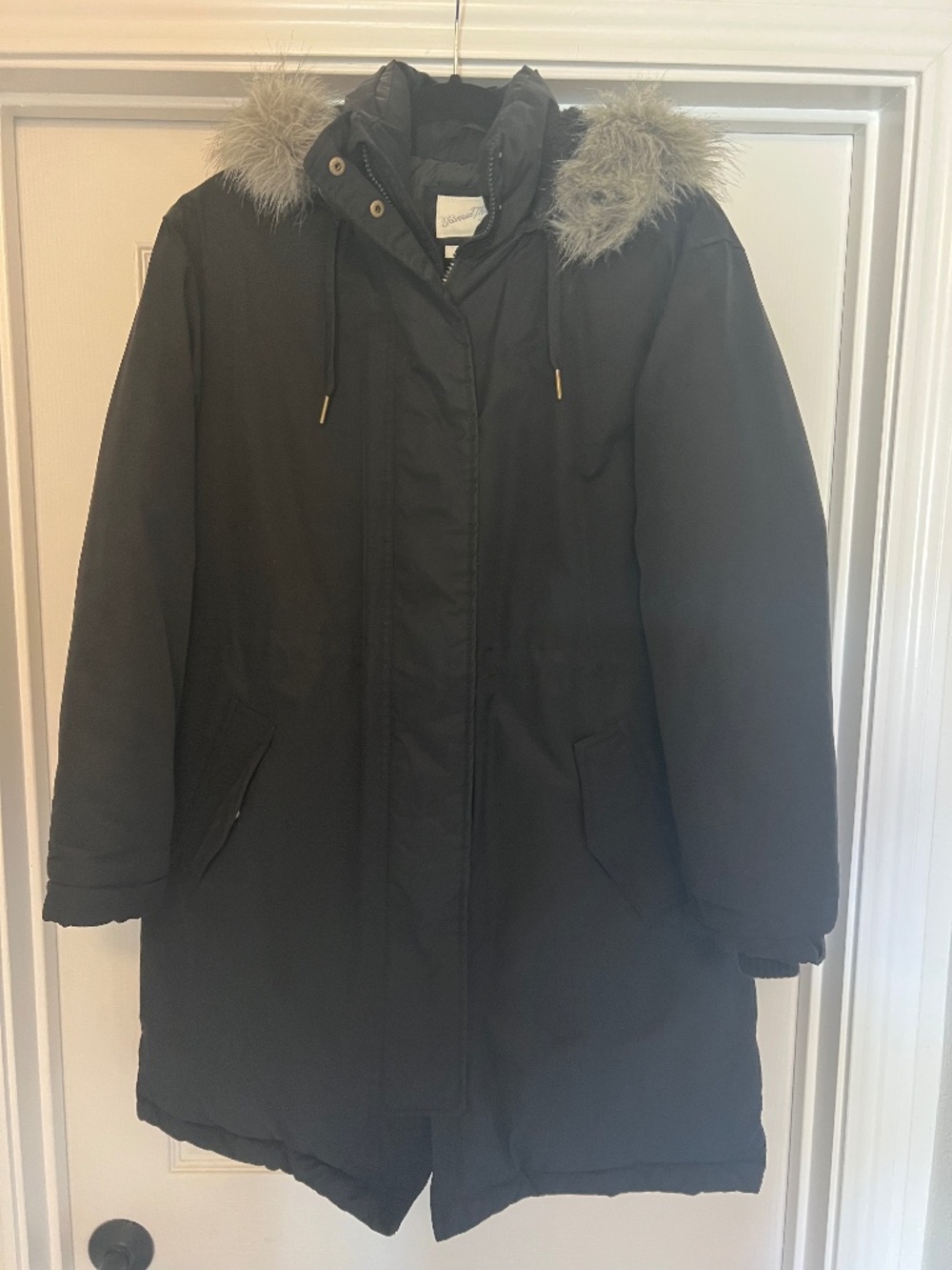 Black puffer coat with faux fur hood